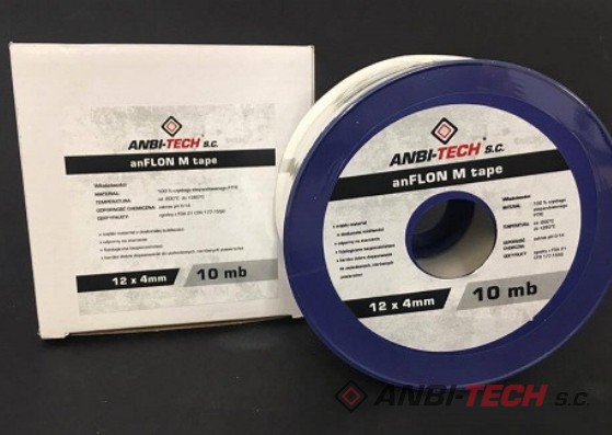 White PTFE sealing tape wound on a blue spool, standing next to a square box against a dark background.